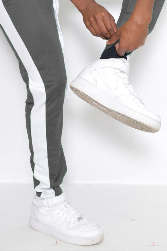 SINGLE STRIPE ANKLE ZIPPER TRACK PANTS